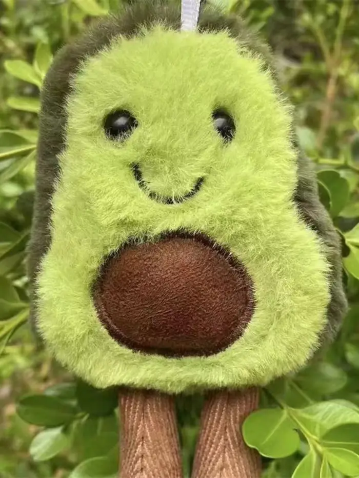 Un joli jouet en peluche avocat pour animaux de compagnie, adapté à la compagnie quotidienne des chi